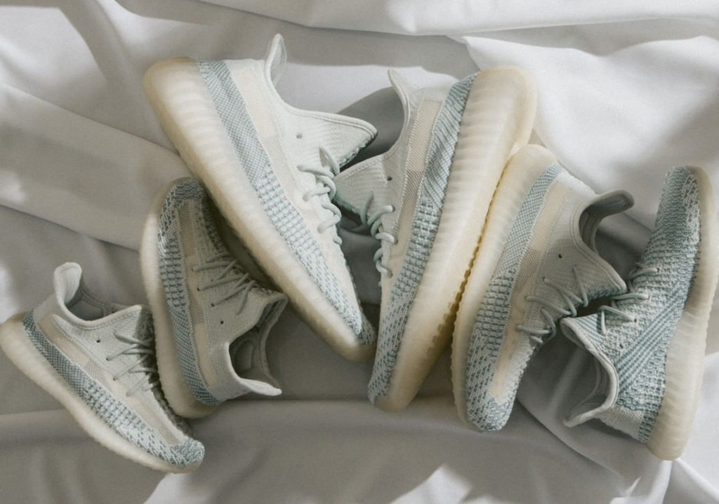 Adidas yeezy bianche store con schizzi colorati